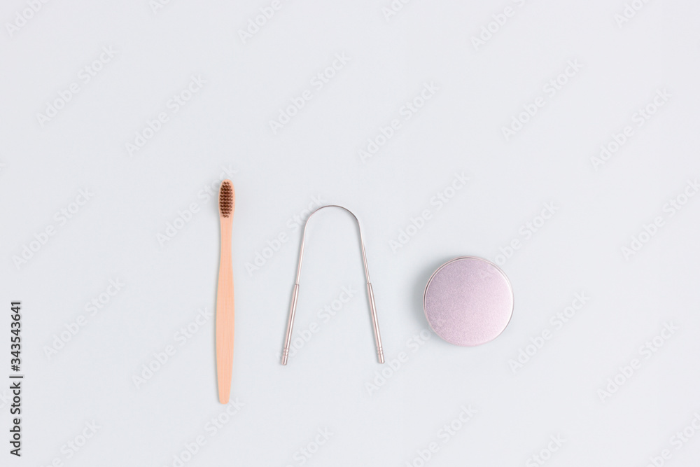 Accessories for tooth hygiene on a beige background. Plastic free concept with copy space. Accessories for tooth hygiene on a beige background. Plastic free concept with copy space.