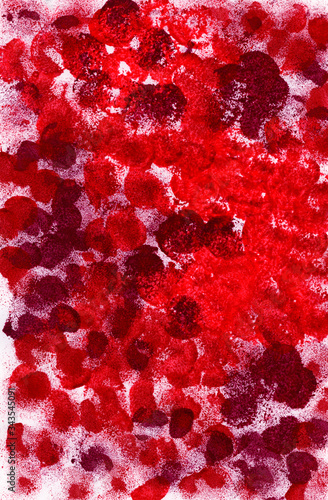 Pink and maroon spots on a white background.