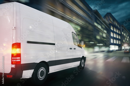 Super fast delivery of package service with a fast moving van on cityscape