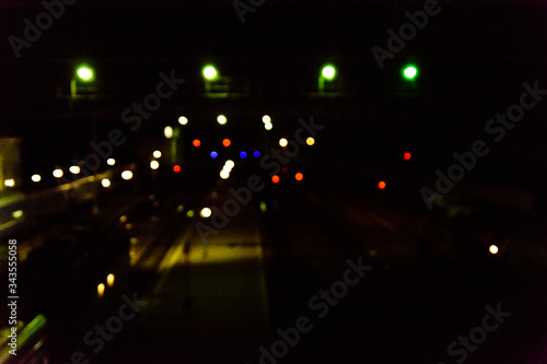Blurred lights of the railway station. Bokeh background