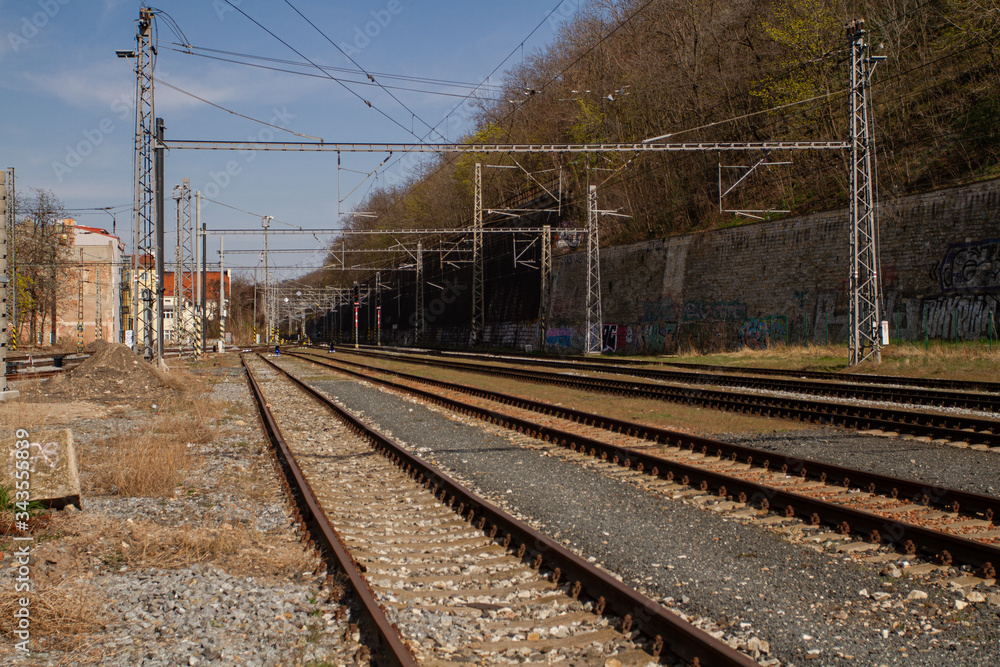 
train tracks in prague in spring in czech republic and architecture around