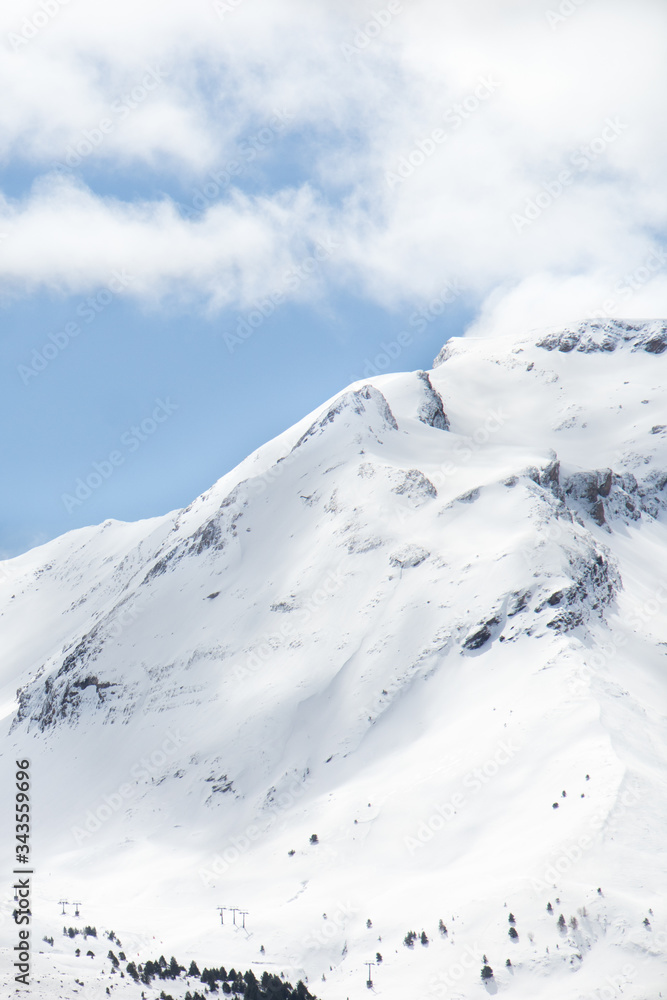 Snowy mountain with blue sky