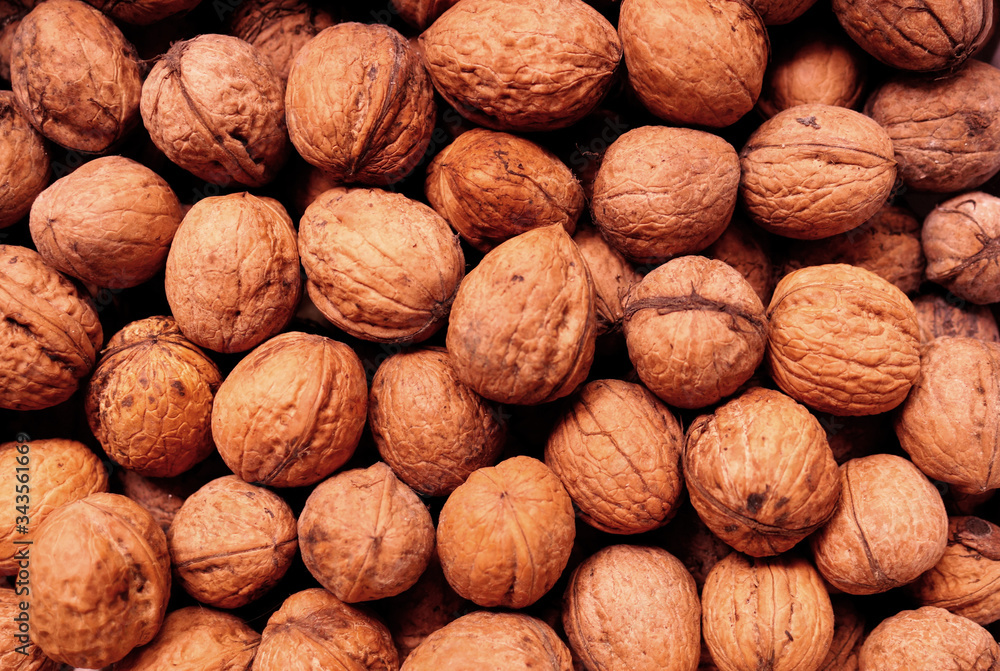 Natural walnuts background.