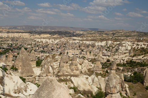 Panoramic view of rocky landscape with blue sky