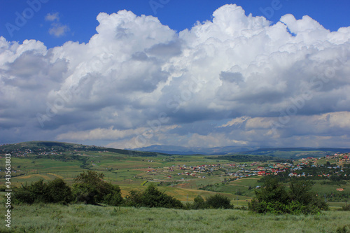 Azerbaijan. Cumulus clouds above ground
