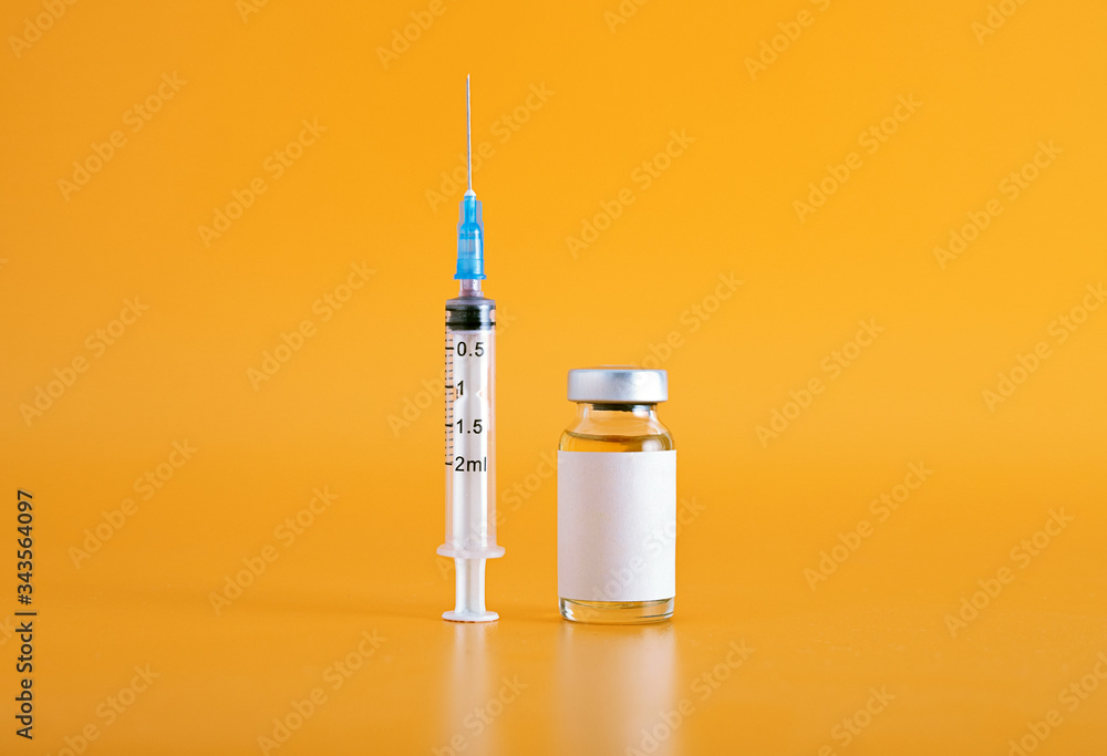 Syringe and a glass vial Syringe and a glass vial