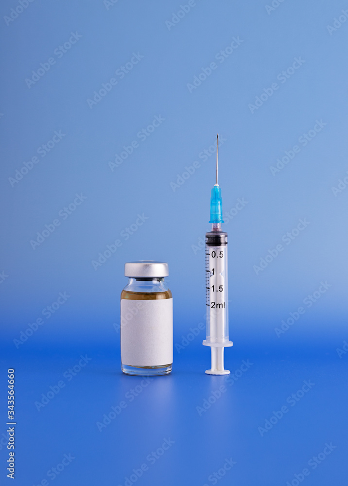 Syringe and a glass vial Syringe and a glass vial