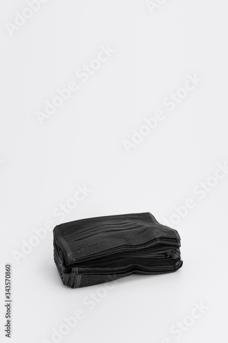 Isolated New Hygienic Mask black colour on the white background in studio light.
