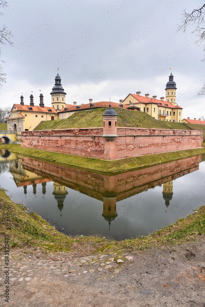 Nesvizh, Belarus - March 2020. Beautiful medieval Nesvizh castle. Famous landmark in Belarus residential castle of the Radziwill family in Nesvizh. Medieval castle complex Niasvizh. UNESCO heritage 