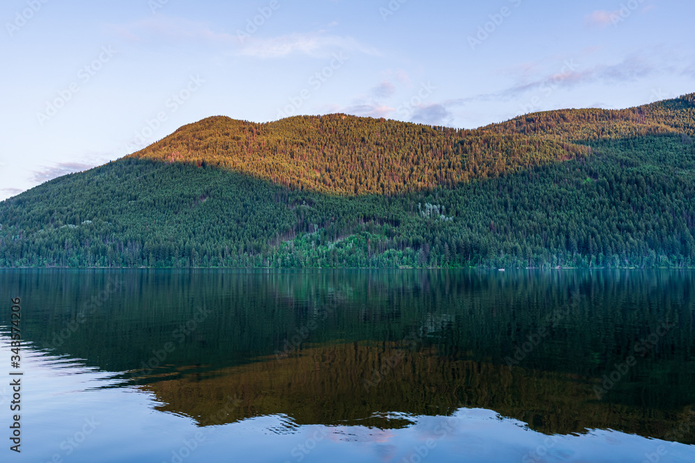 calm paul lake during a summer evening british columbia canada.