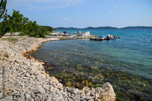 Small pebble beach along the Adriatic Sea in Croatia near Pirovac
