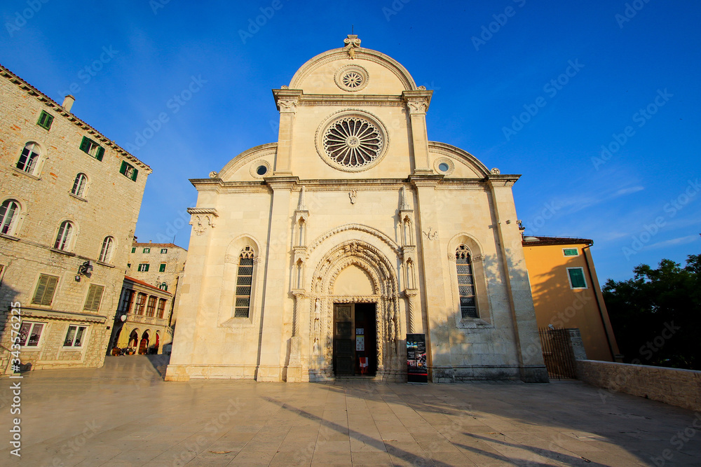 Fototapeta premium Cathedral of St. James in Šibenik, Croatia - Sunset casting shadows in the facade of this historical building in the Old Town of Šibenik