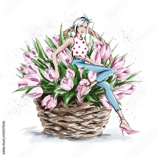 Hand drawn beautiful young woman sitting in flower basket. Fashion woman with bow on her head. Stylish girl sitting on wicker basket with tulips. Fashion illustration.