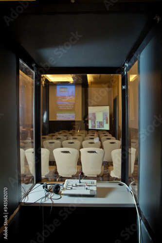 Cuadro en lienzo Soft focus of wireless Conference microphones and notebook in a meeting room