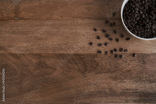 Detail coffee beans on wood table