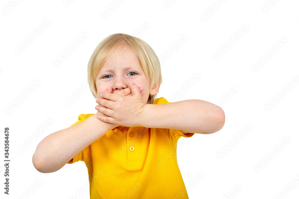 Surprised boy closes his mouth with his hand Surprised boy closes his mouth with his hand