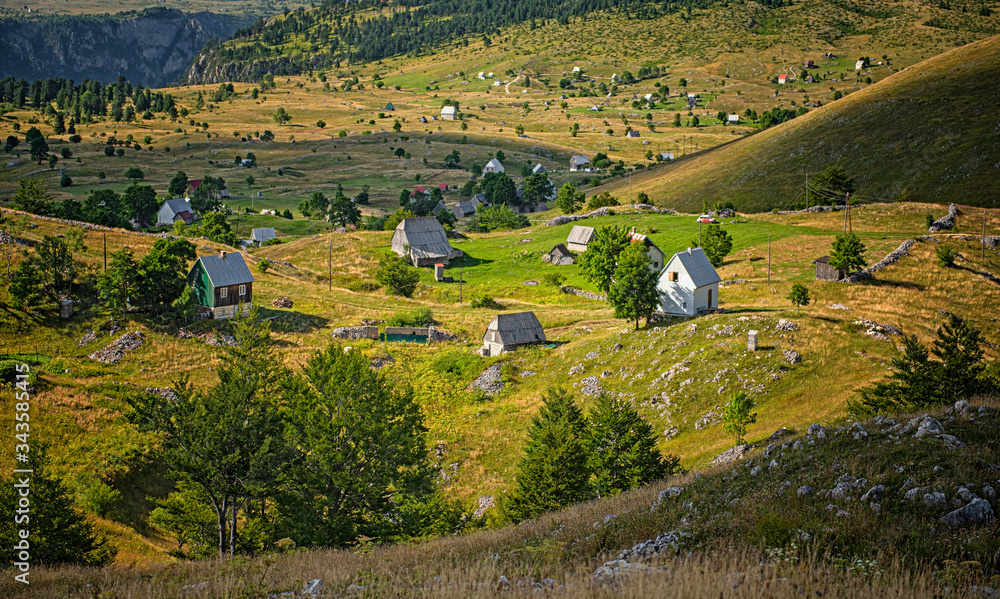 Nice village with wooden houses in the mountains of Montenegro
