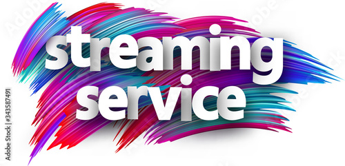 Streaming service sign in two lines on brush strokes background.