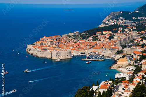 Fototapeta Naklejka Na Ścianę i Meble -  Aerial view of Dubronik's walled old medieval city on the coast of the Adriatic Sea in Croatia - Fortress Saint John