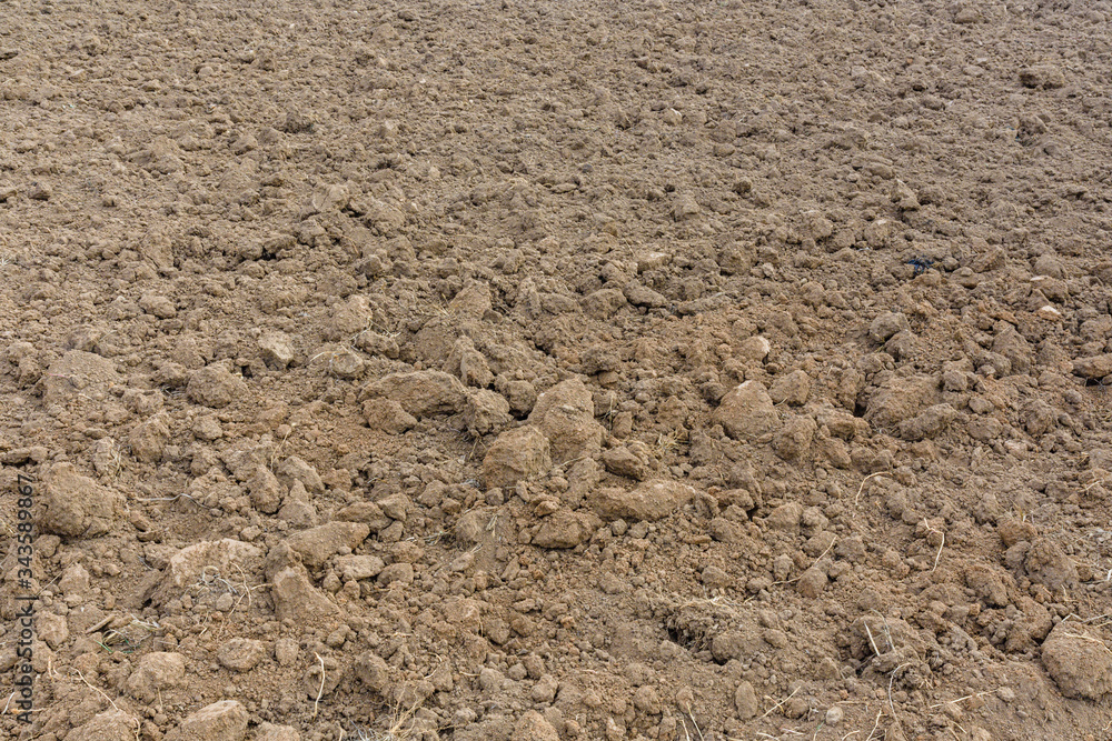Background of the plowed field prepared for sowing Background of the plowed field prepared for sowing