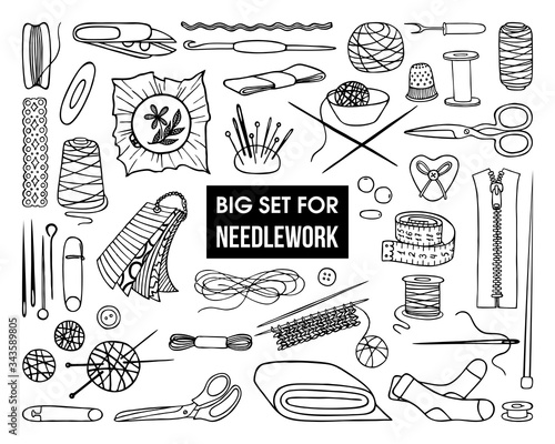 A SET OF TOOLS AND ACCESSORIES FOR NEEDLEWORK ON A WHITE BACKGROUND