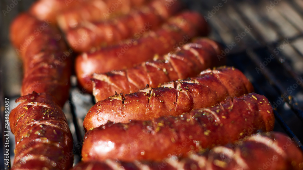 Beautifully browned sausages on a wood grill until you feel like eating them