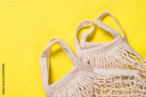 Mesh bag for zero waste shopping on color background.