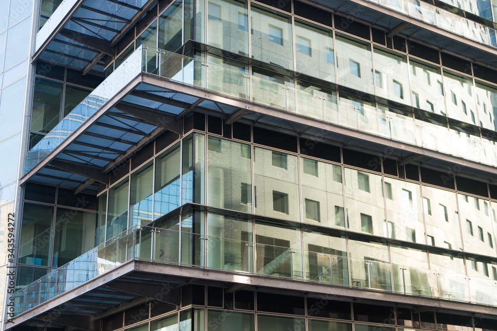 residential complex with balcony. glass office building background. modern life concept. real estate. modern architecture design. discover new opportunities. business center. sale and rent