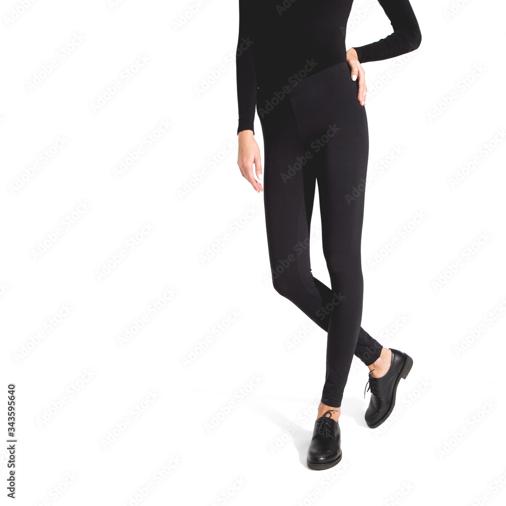 Woman wear black blank leggings mockup, isolated, clipping path. Women in clear leggins template. Cloth pants design presentation. Sport pantaloons stretch tights model wearing. Slim legs in apparel. Woman wear black blank leggings mockup, isolated, clipping path. Women in clear leggins template. Cloth pants design presentation. Sport pantaloons stretch tights model wearing. Slim legs in apparel.