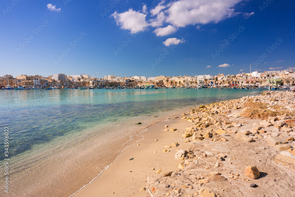 Beautiful beach at the Mediterranean Village of Marsaxlokk, Malta Beautiful beach at the Mediterranean Village of Marsaxlokk, Malta