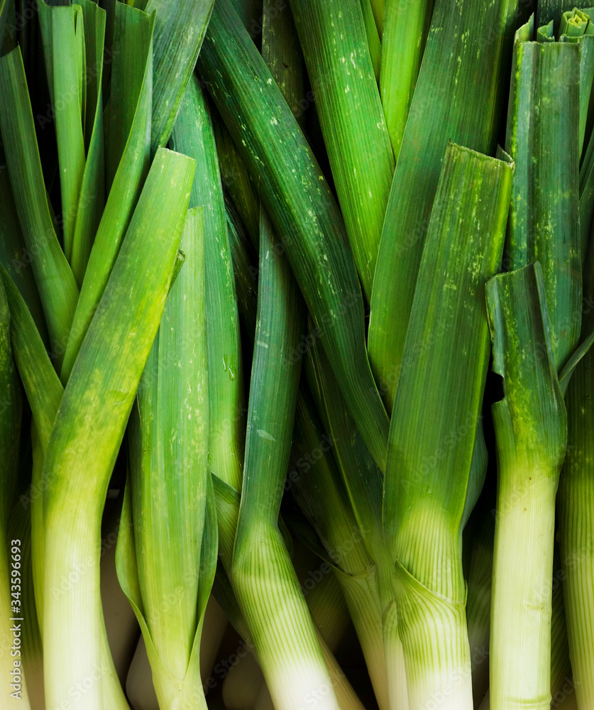 Spring onions also known as salad onions, green onions or scallions Spring onions also known as salad onions, green onions or scallions