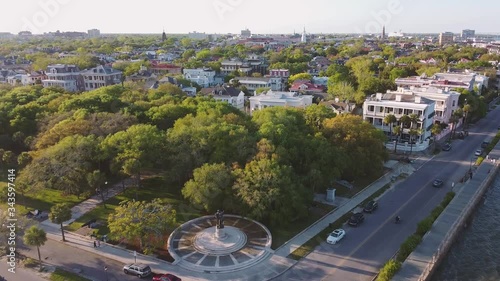 4k Aerial of Charleston South Carolina at Sunrise. Aerial flying over city of in the morning. Urban historic costal town at sunrise. Luxury wealthy town. City of churches. perspective of downtown