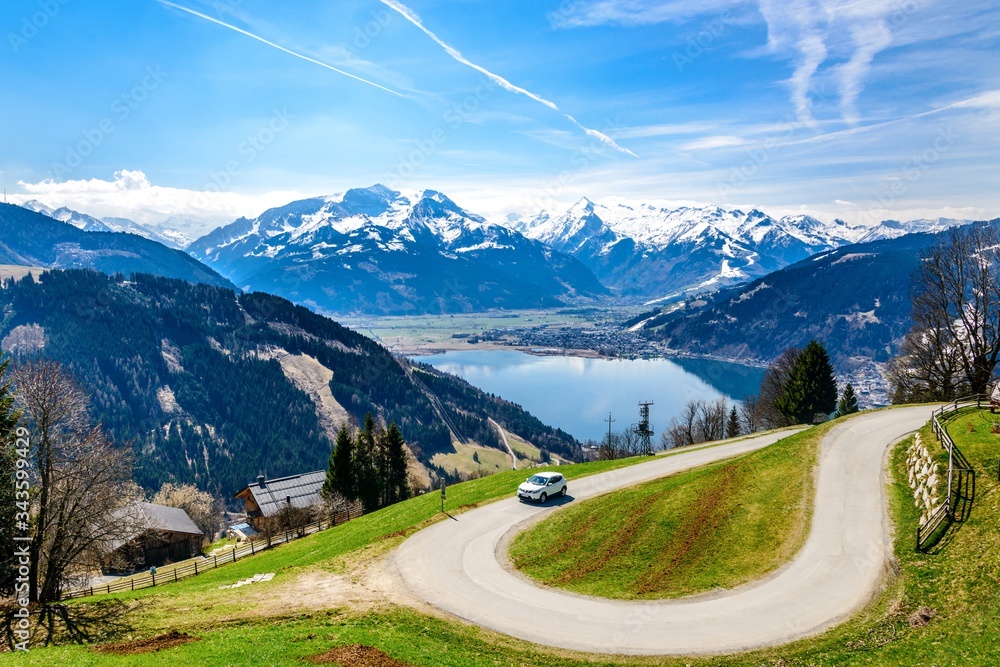 Zell am See. Panorama view on Zellersee lake with alps, green fields, blue sky.  Zillertal. Austria, Tirol