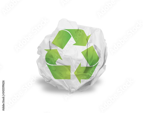 Recycle logo on crumped paper