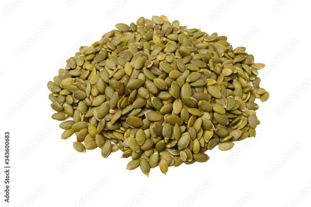 Peeled Pumpkin Seeds. Unshelled kernels. Isolate on a white background. Peeled Pumpkin Seeds. Unshelled kernels. Isolate on a white background.