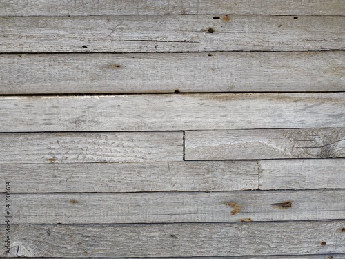 Fotografija Light gray wooden horizontal boards with rust spots texture.