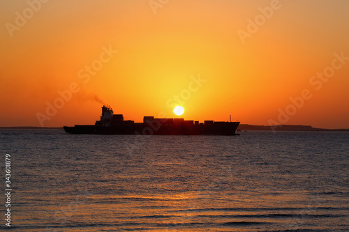 ship on the background of the Golden sunrise