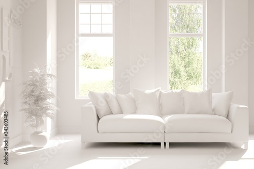 White living room with sofa and summer landscape in window. Scandinavian interior design. 3D illustration