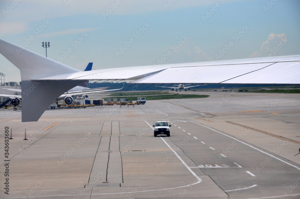 Runaway at the airport with wing and staff car, Houston, Texas