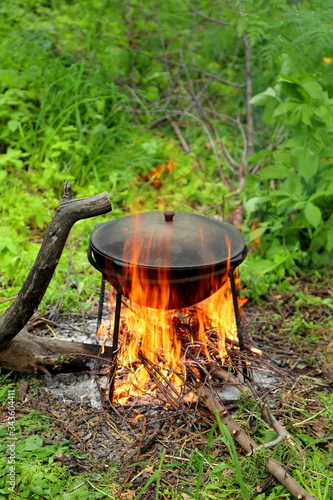 
cooking on a campfire in nature