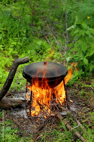 
cooking on a campfire in nature