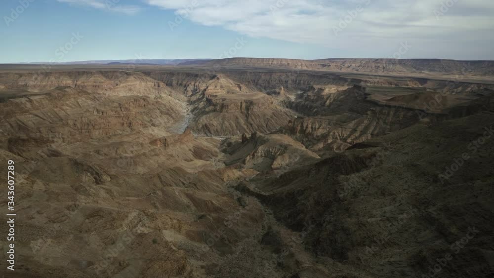 Tilt Upward: Relaxing View of the Beautiful Ridges of the Remote River Canyon - Fish River Canyon, Namibia Tilt Upward: Relaxing View of the Beautiful Ridges of the Remote River Canyon - Fish River Canyon, Namibia