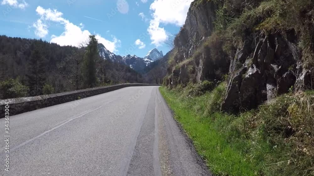 POV of a road cyclist climbing through a mountainous landscape on a sunny day in the Pyrenees.
POV of a road cyclist climbing through a mountainous landscape on a sunny day in the Pyrenees.