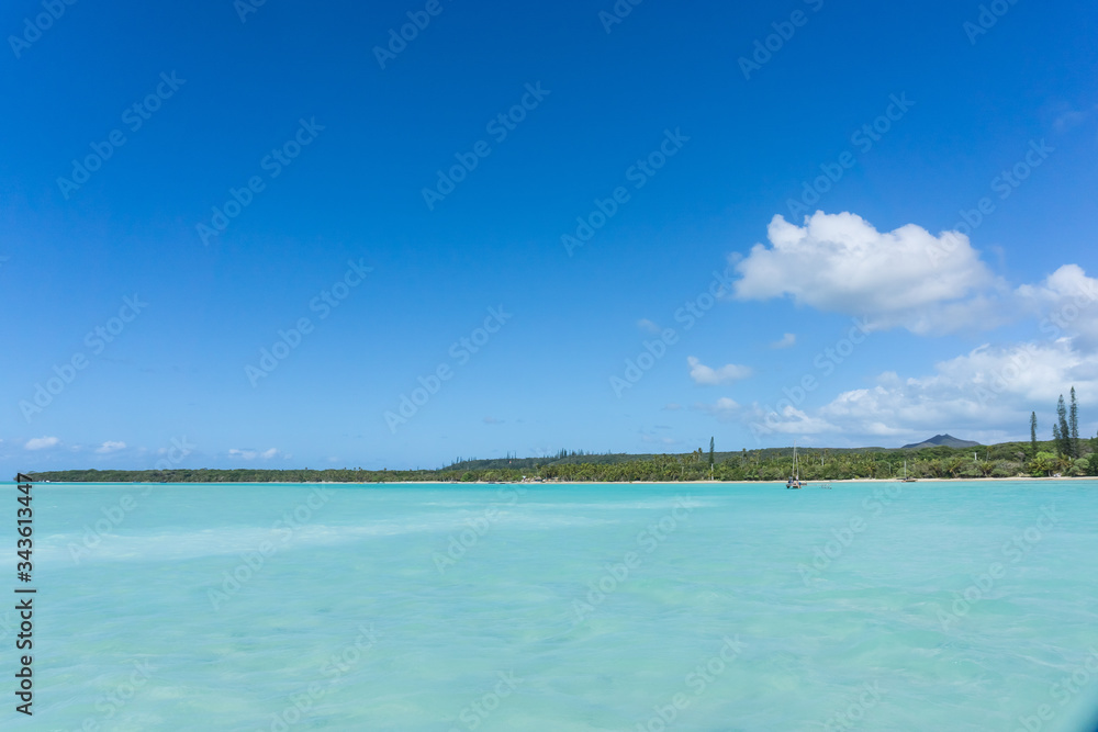 seascape of famous Upi bay, new caledonia: turquoise lagoon, typical rocks, blue sky seascape of famous Upi bay, new caledonia: turquoise lagoon, typical rocks, blue sky