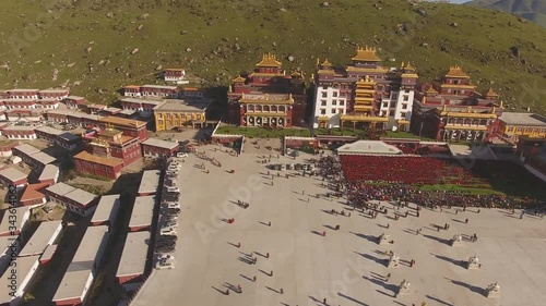 Famous Dzogchen Buddhist Monastery in Kham. Dege County, Garze Tibetan Autonomous Prefecture. Sichuan, China. (aerial photography) photo