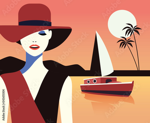 beautiful woman fashionable with hat on the beach
