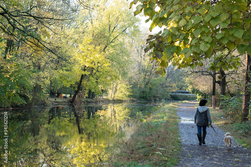 Beautiful walk along the Delaware Canal in Bucks County, Pennsylvania, on a sunny morning of October, at the beginning of autumn.