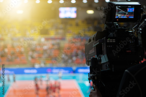 Blurred background of professional volleyball league cup championship international competition live sport news tv show from indoor arena with fans crowd cheer up and watching from stand for victory