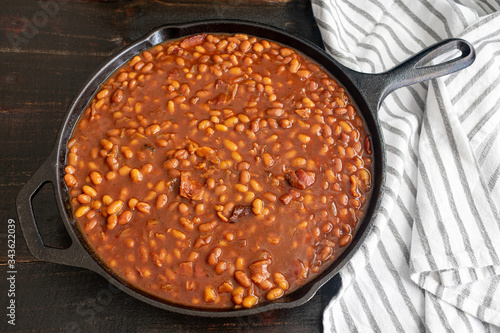 Принти на полотні Bourbon Baked Beans in a Cast Iron Skillet: Pork and beans seasoned with bourbon