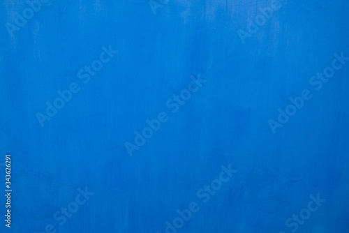 Bright sky blue painted surface with texture